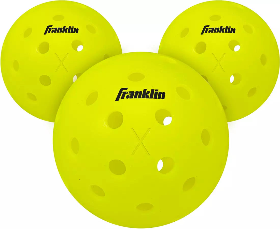 Three yellow pickleball balls with Franklin branding on a white background