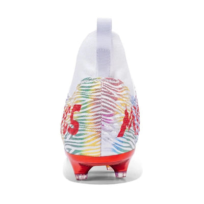 Colorful soccer cleat with red accents on the back view